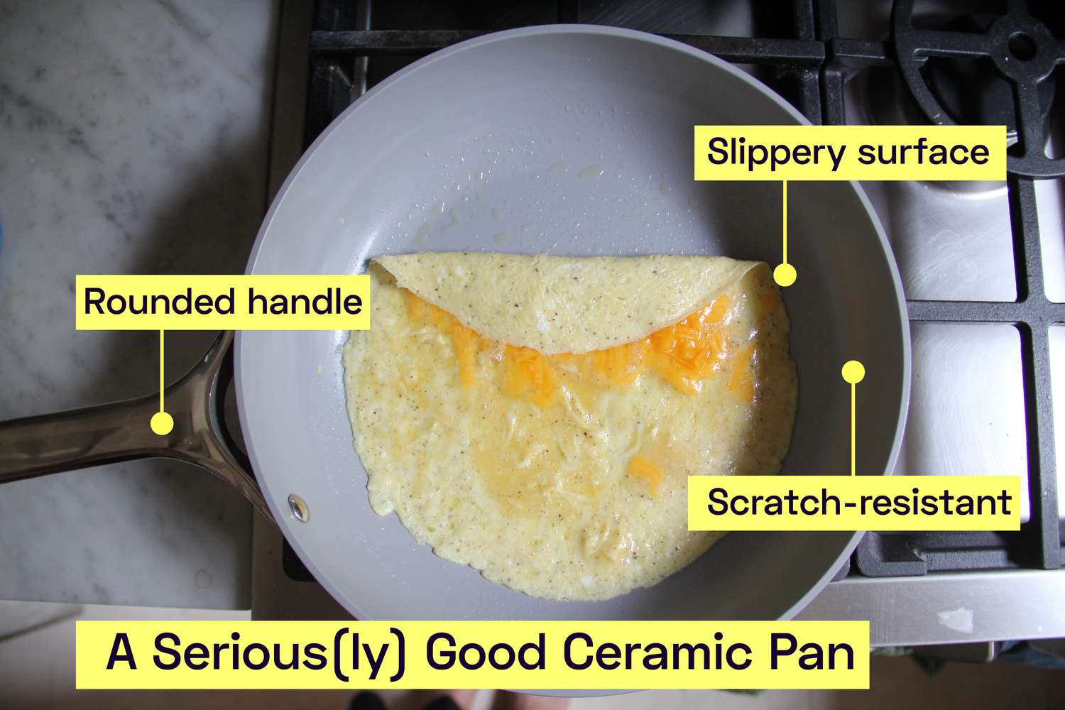 A ceramic skillet cooking a cheese omelette.