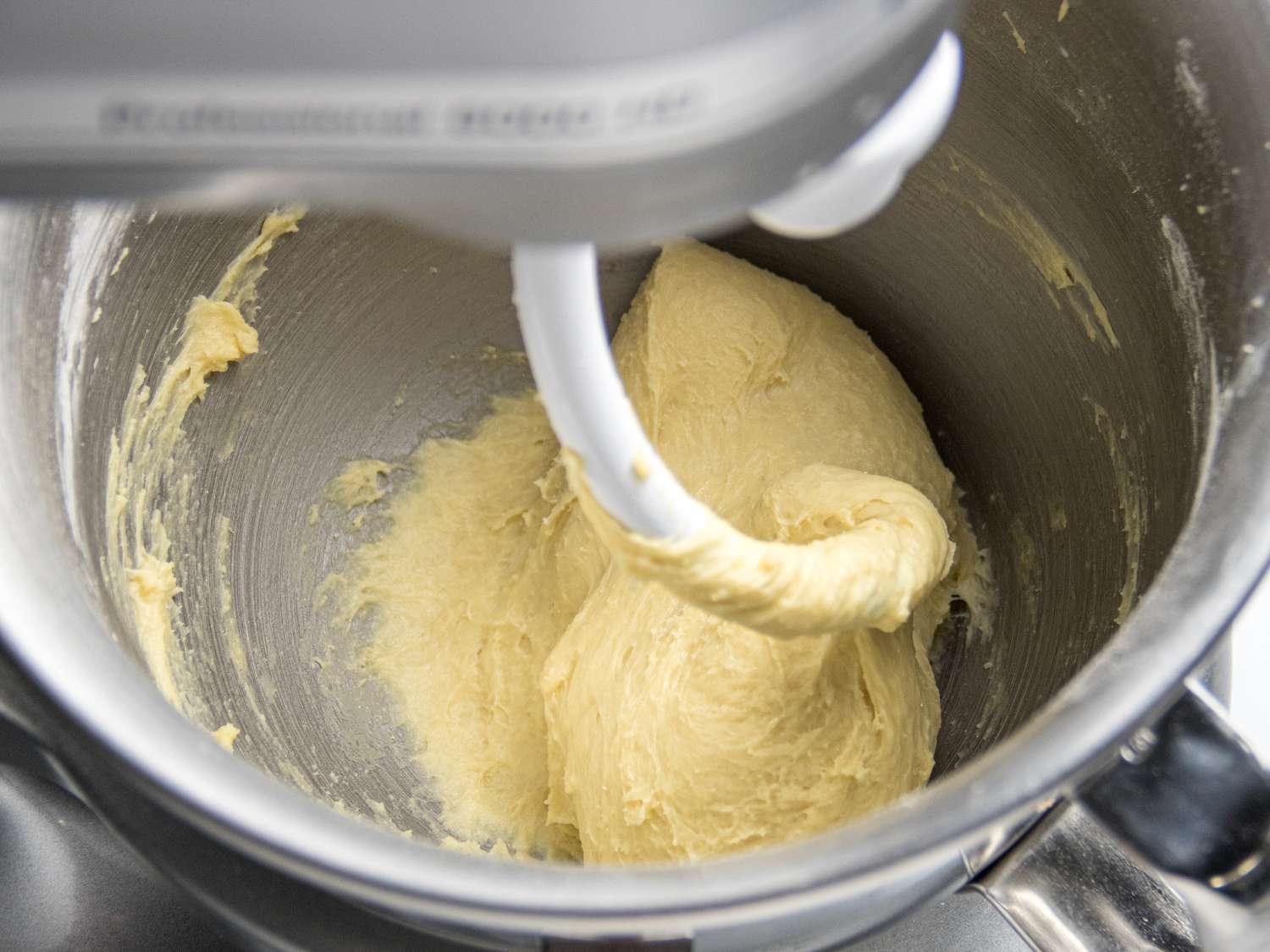mixing batter together in stand mixer with dough hook attachment