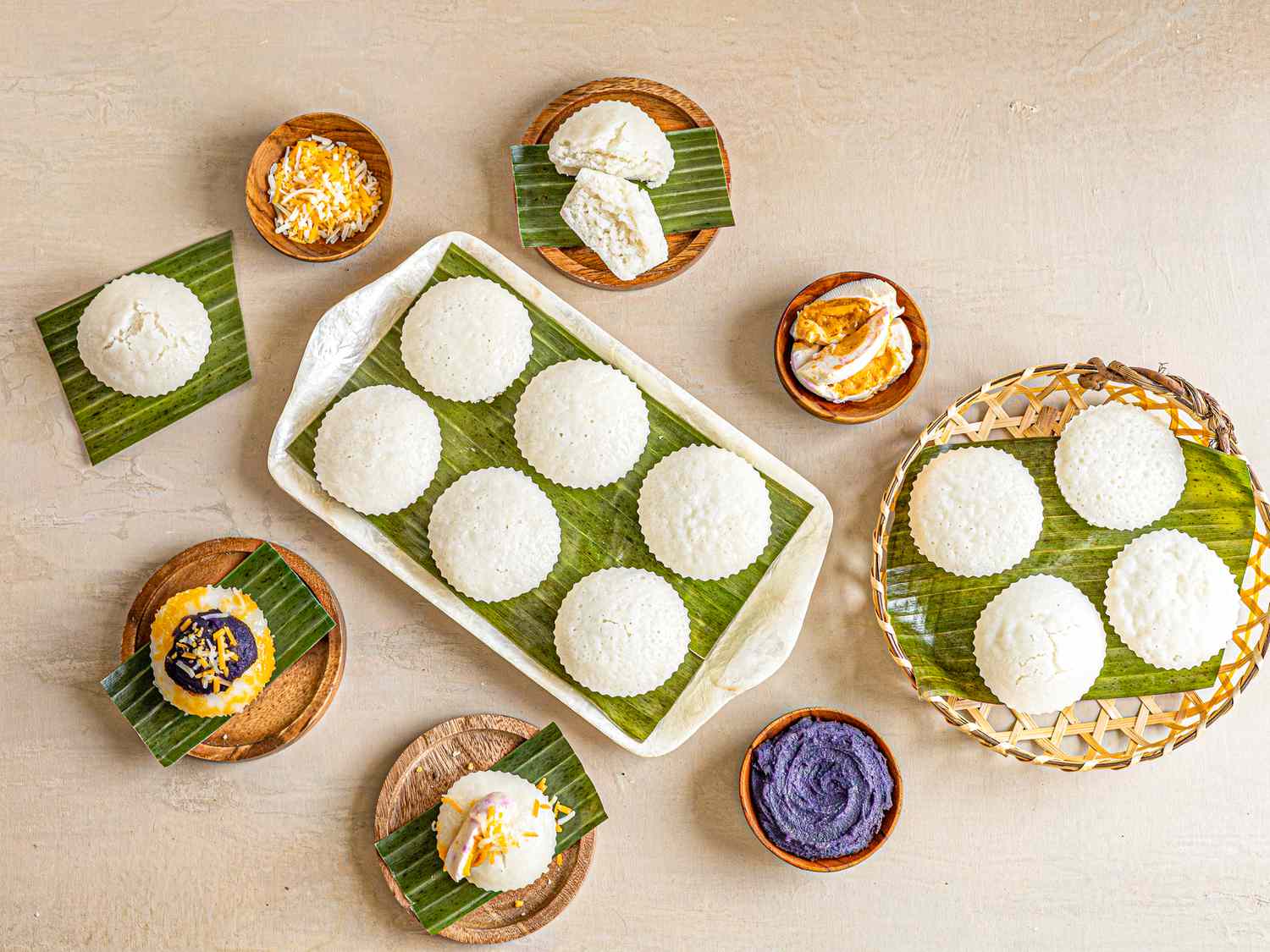 Overhead view of puto with a variety of toppings