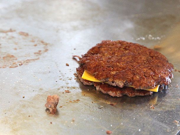 Stack of two smash patties with cheese in the middle