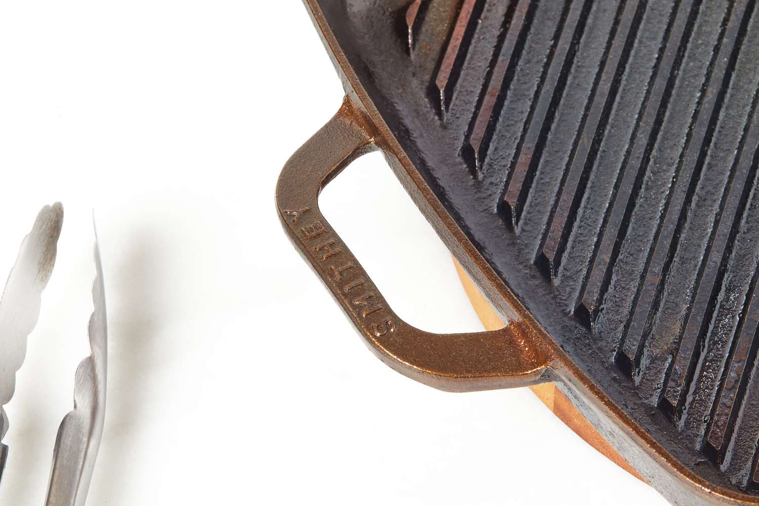 Close-up of the Smithey Ironware Co. No. 12 Grill Pan's. handle.