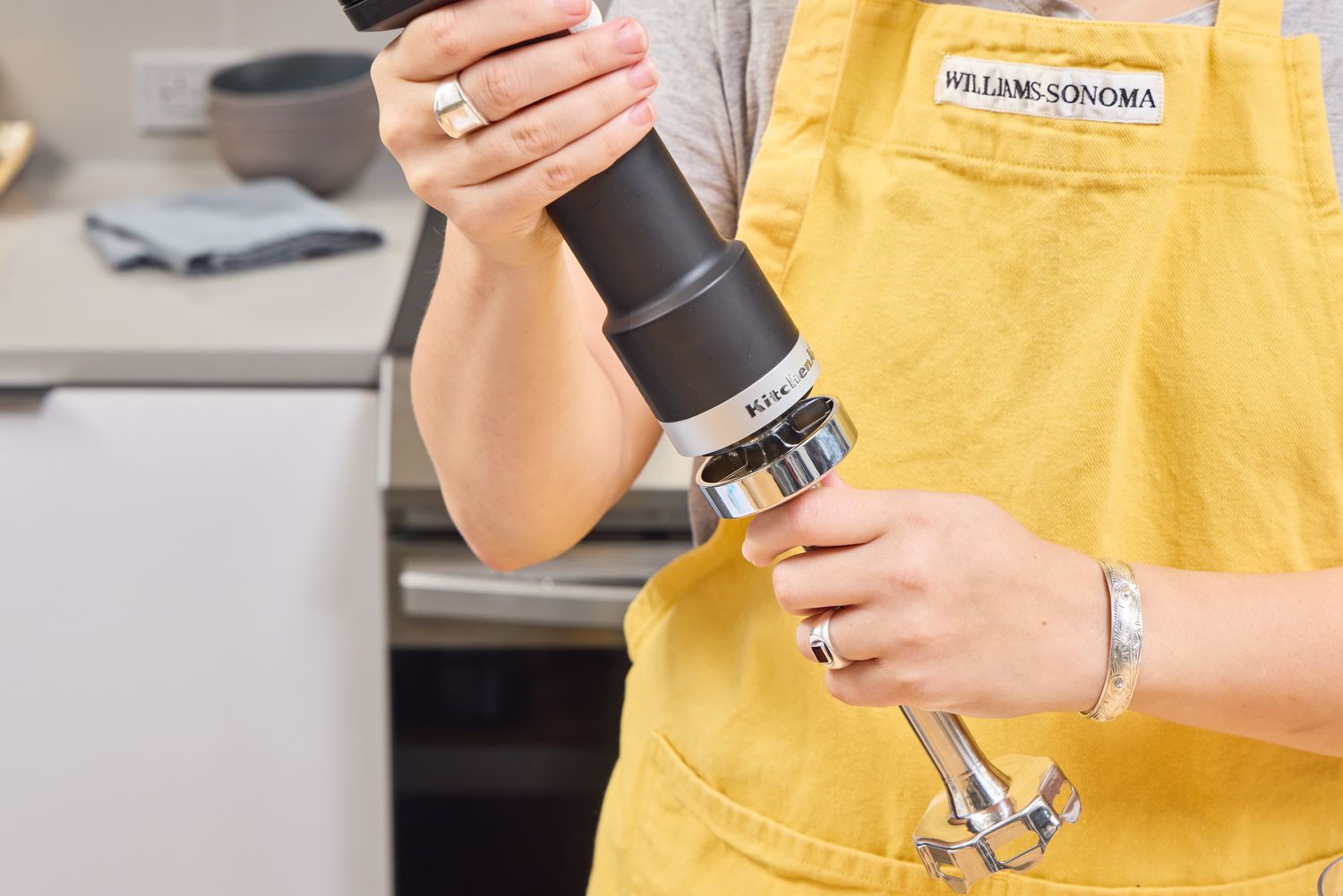 A person assembles the KitchenAid Go Cordless Hand Blender