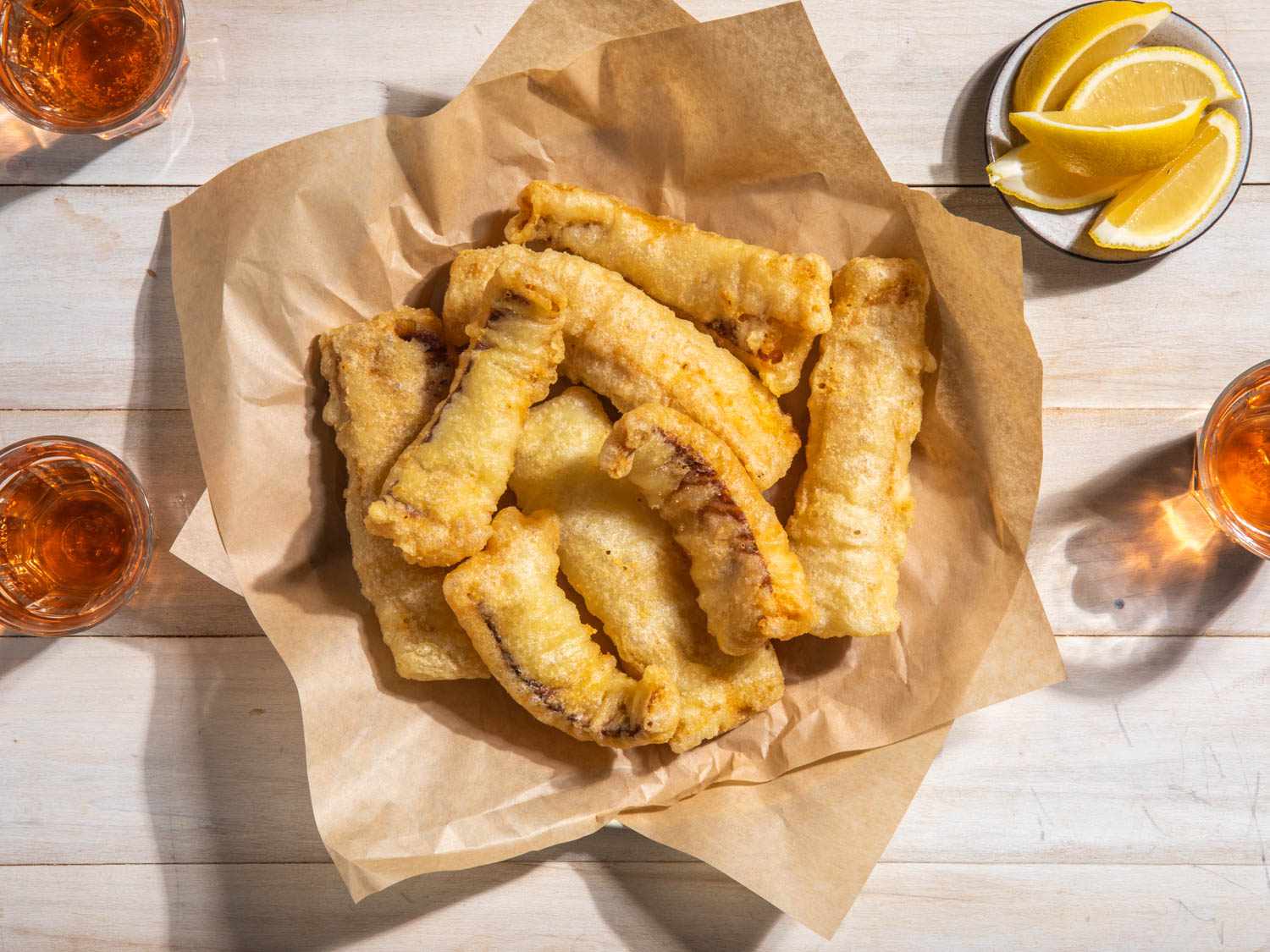 A serving platter of fried salt cod fillets