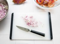 the material knife with minced shallots