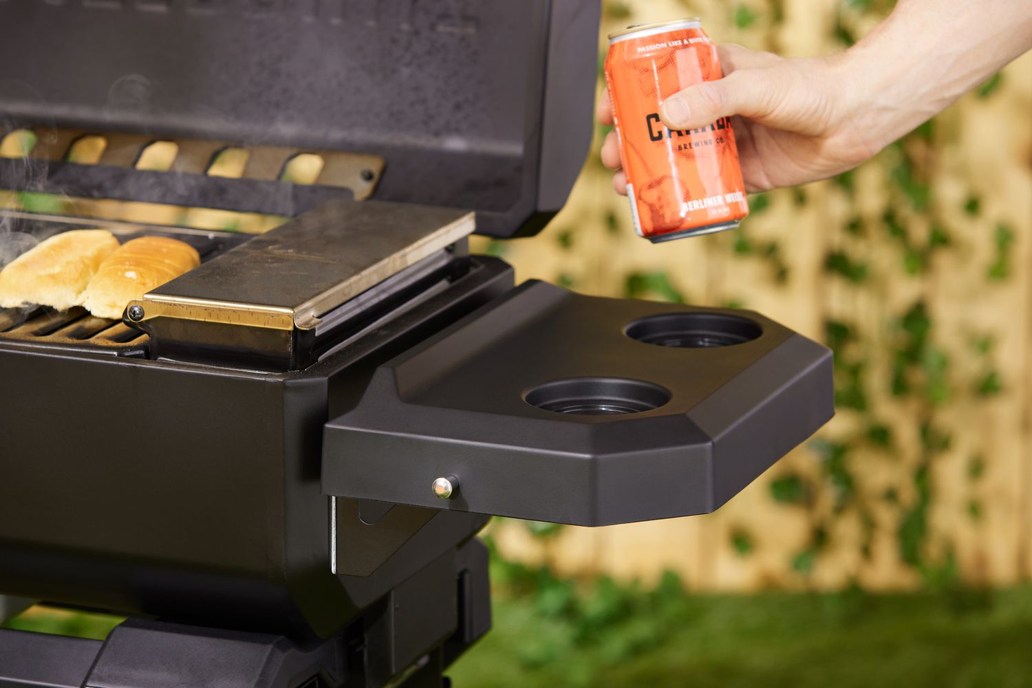 The cupholders on the Masterbuilt portable charcoal grill.