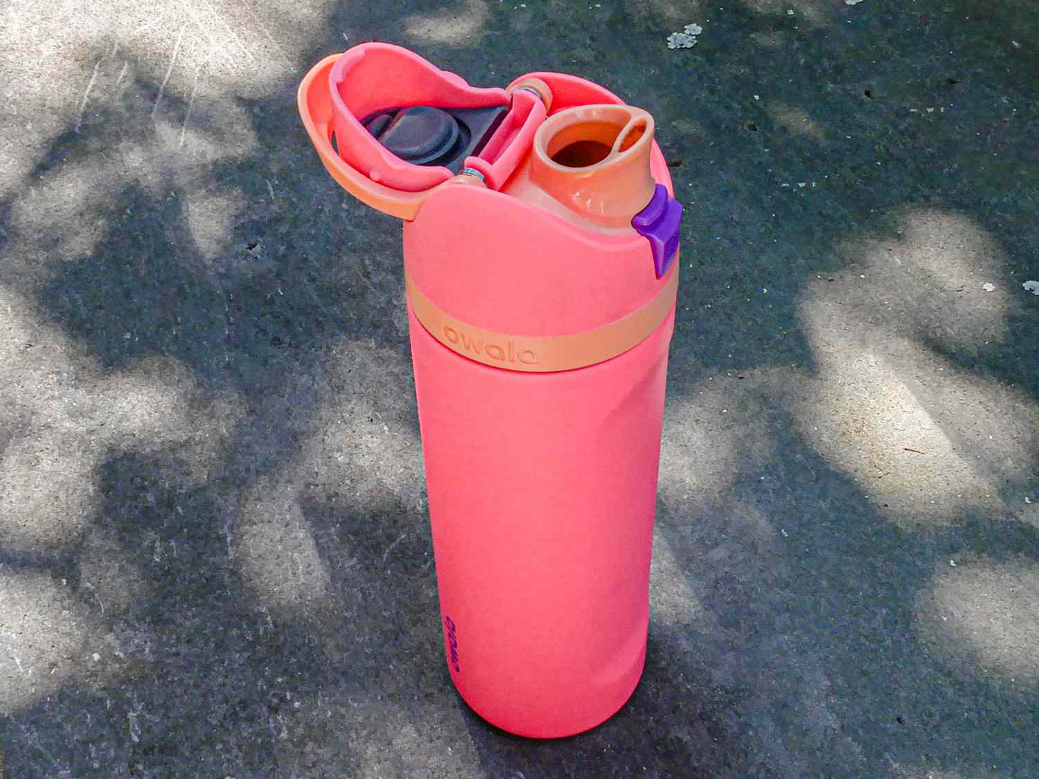 Owala FreeSip Vacuum Insulated Water Bottle with its lid open