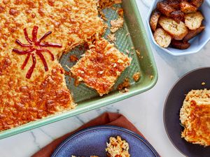 A dish of arroz imperial served with garnishes and side dishes