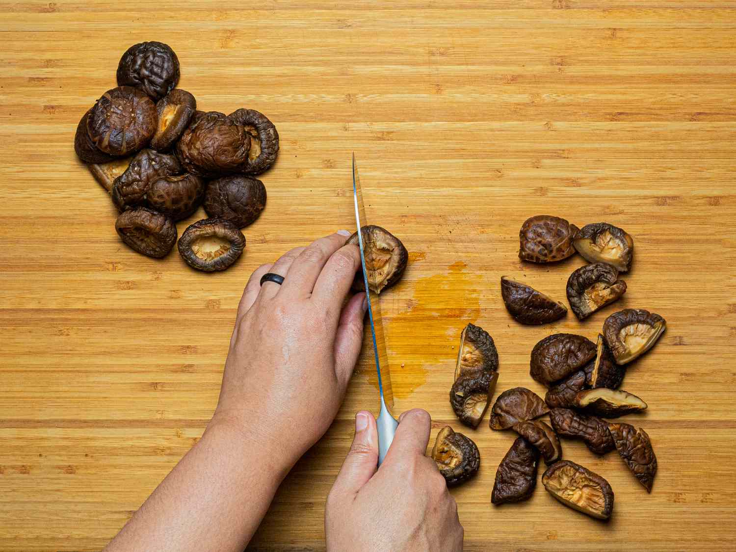 Overhead view of slices mushrooms in half