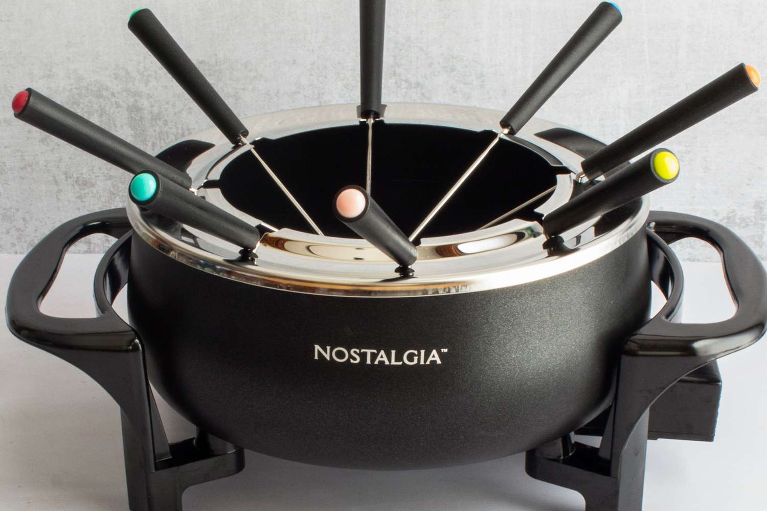 The Nostalgia fondue pot and its color-coded forks.