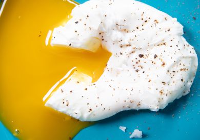 Overhead view of a cut poached egg