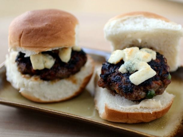 Two shepherd's pie slides, served on a small rectangular platter.