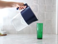 pouring water out of the larq pitcher