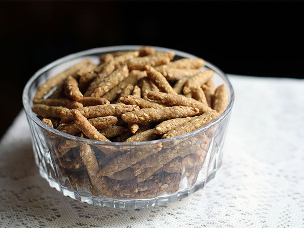A glass bowl full of DIY sesame sticks.