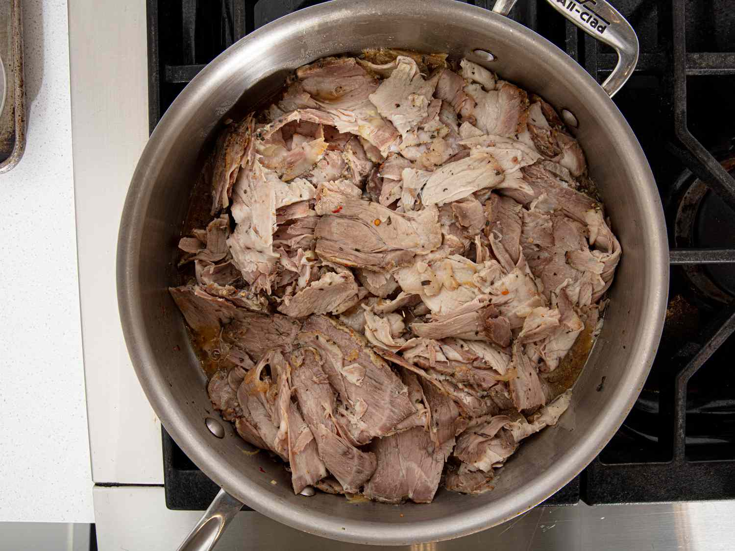 Overhead view of pork in jus