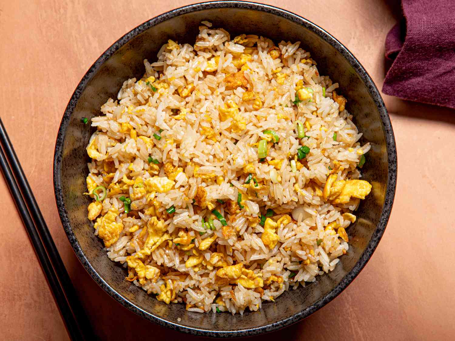 A bowl of egg fried rice seen from above