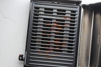 Residue from grilled meat on the Hamilton Beach indoor grill 