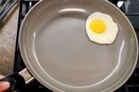 An egg sliding across the surface of a Fissler Ceratal Classic 11" Pan