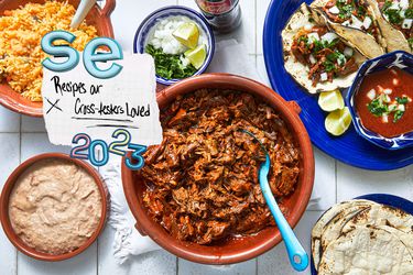 Overhead view of birria, with a graphic that says "SE Recipes our Cross-testers Loved"