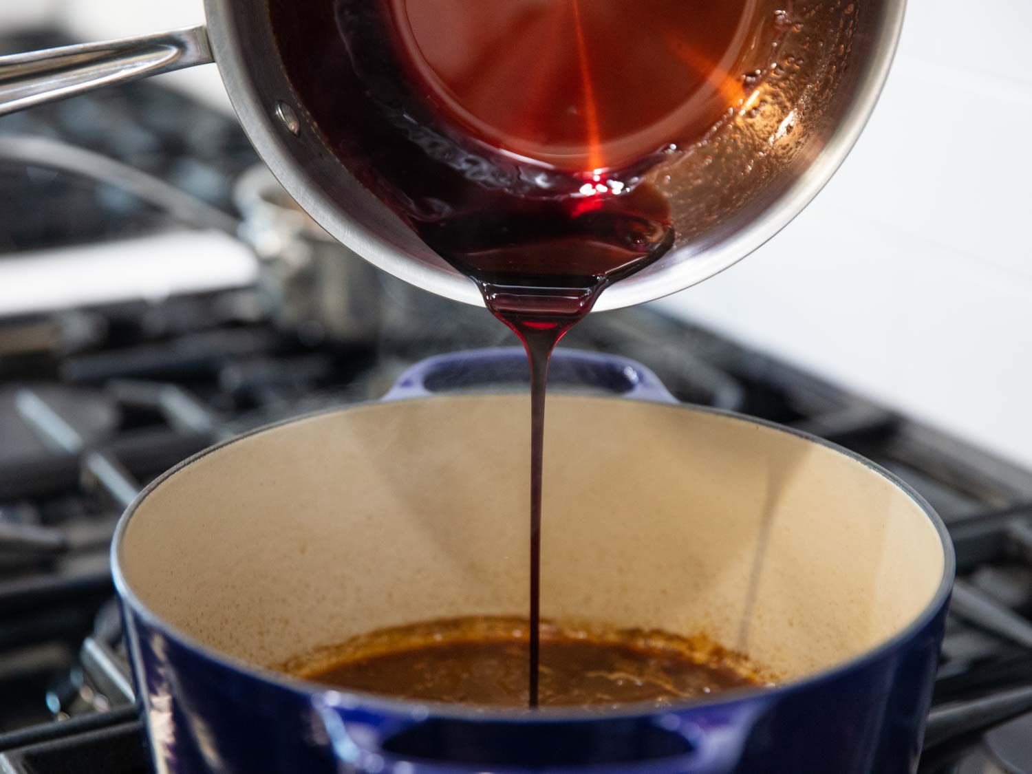 adding port wine reduction to a Dutch oven with braising liquid