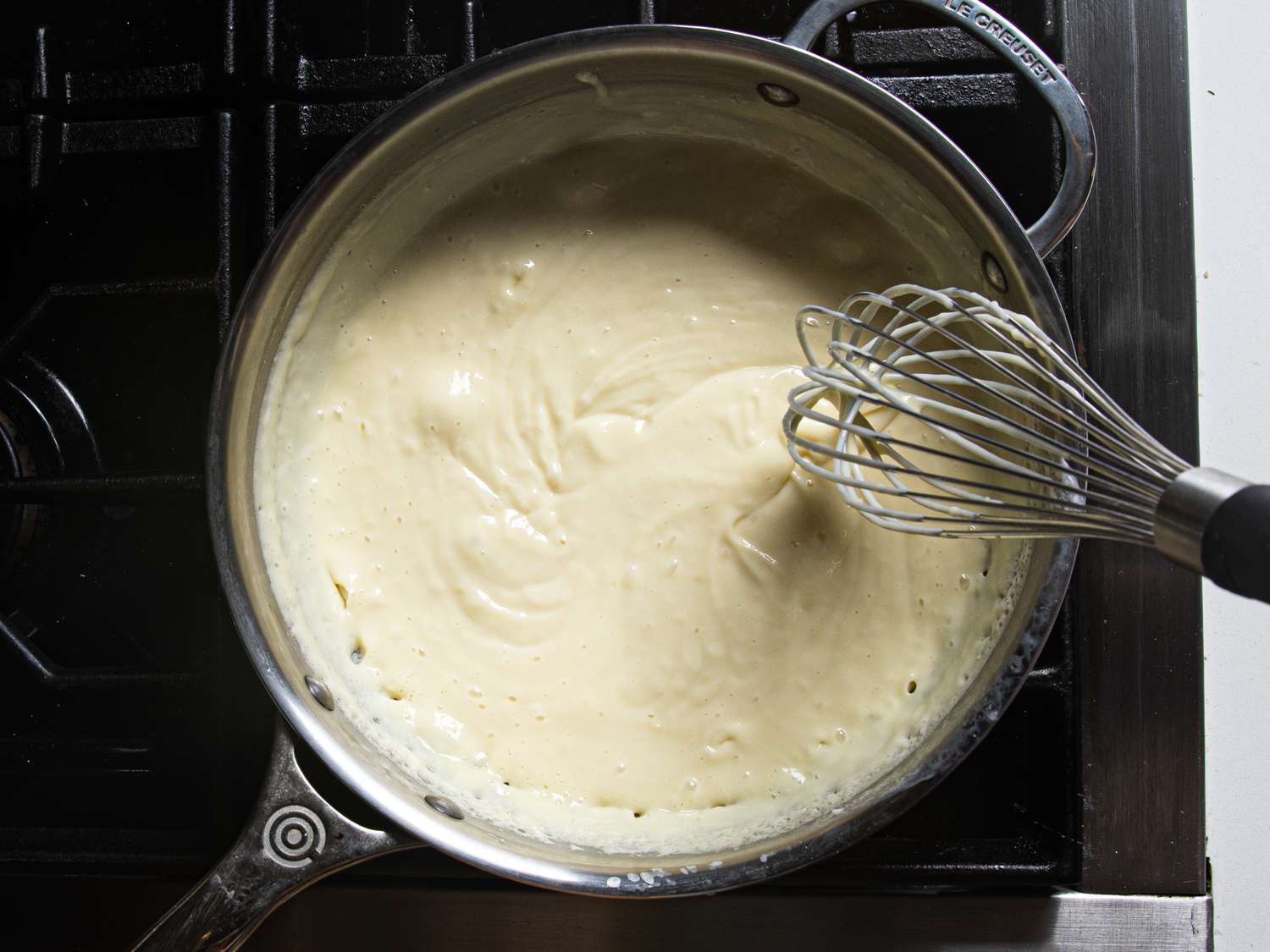 Stirring creme in pot 