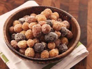Wooden serving bowl of salt-crusted assorted new potatoes