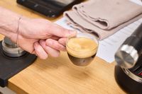 A shot of espresso made using the De'Longhi EC900M Dedica Maestro Espresso Machine