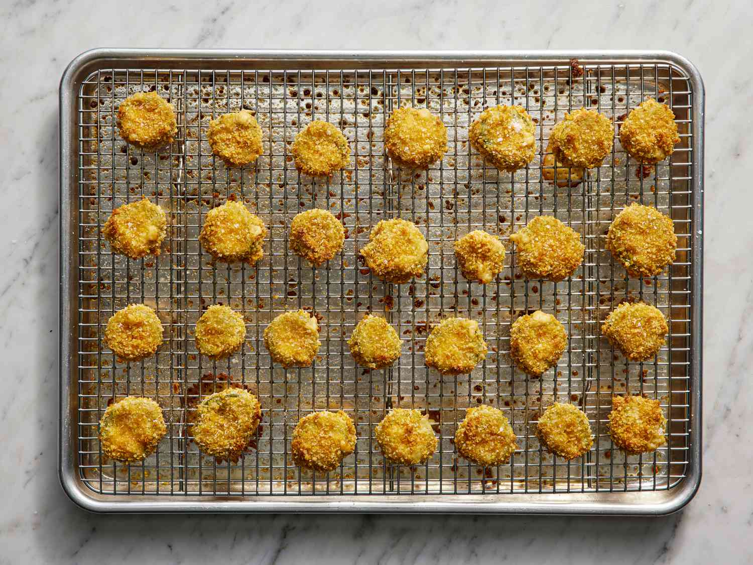 Baked jalapeno rings on a wire rack