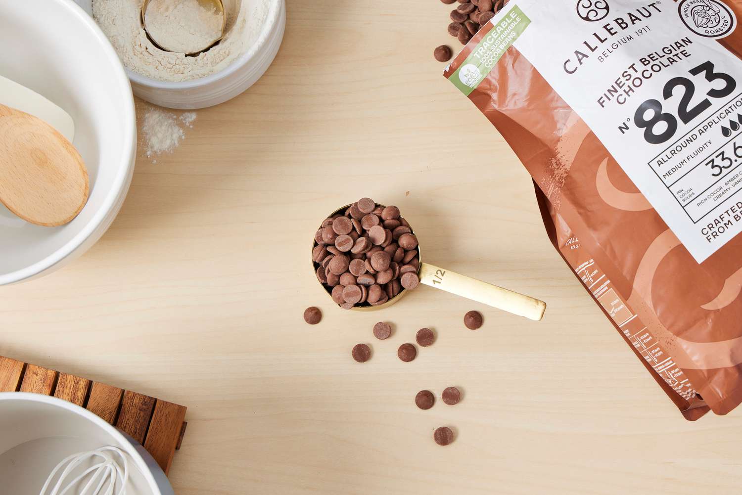 A measuring cup with chocolate chips in it.