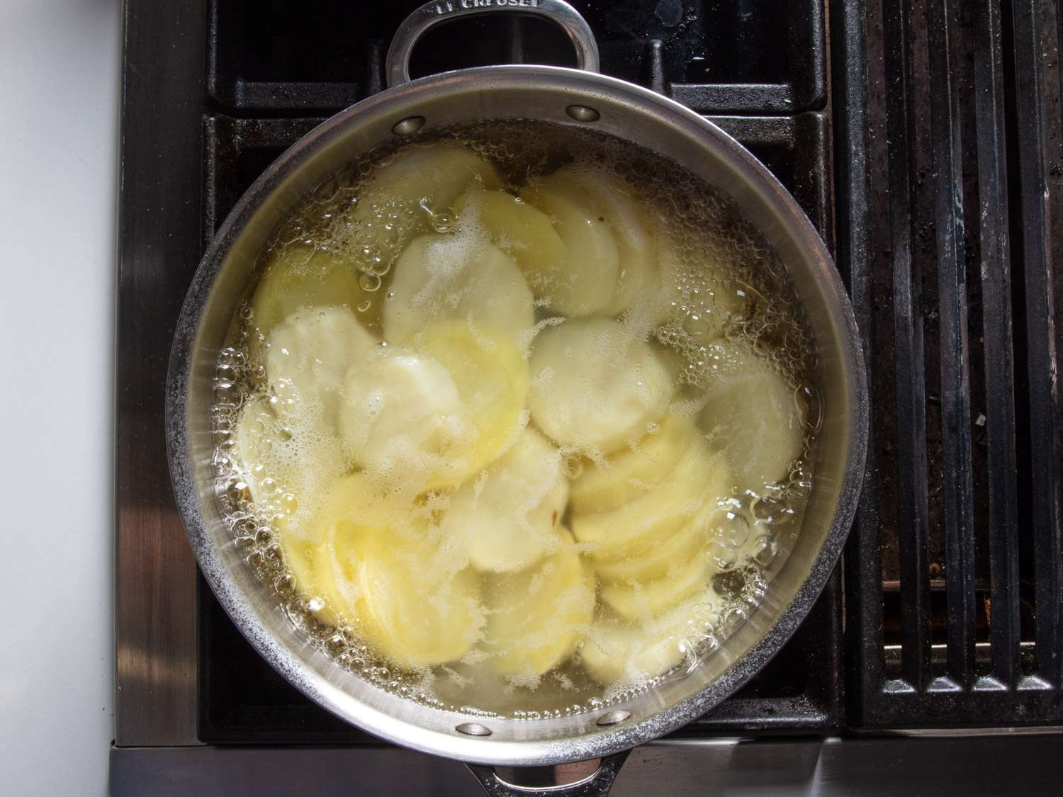boiling sliced potatoes