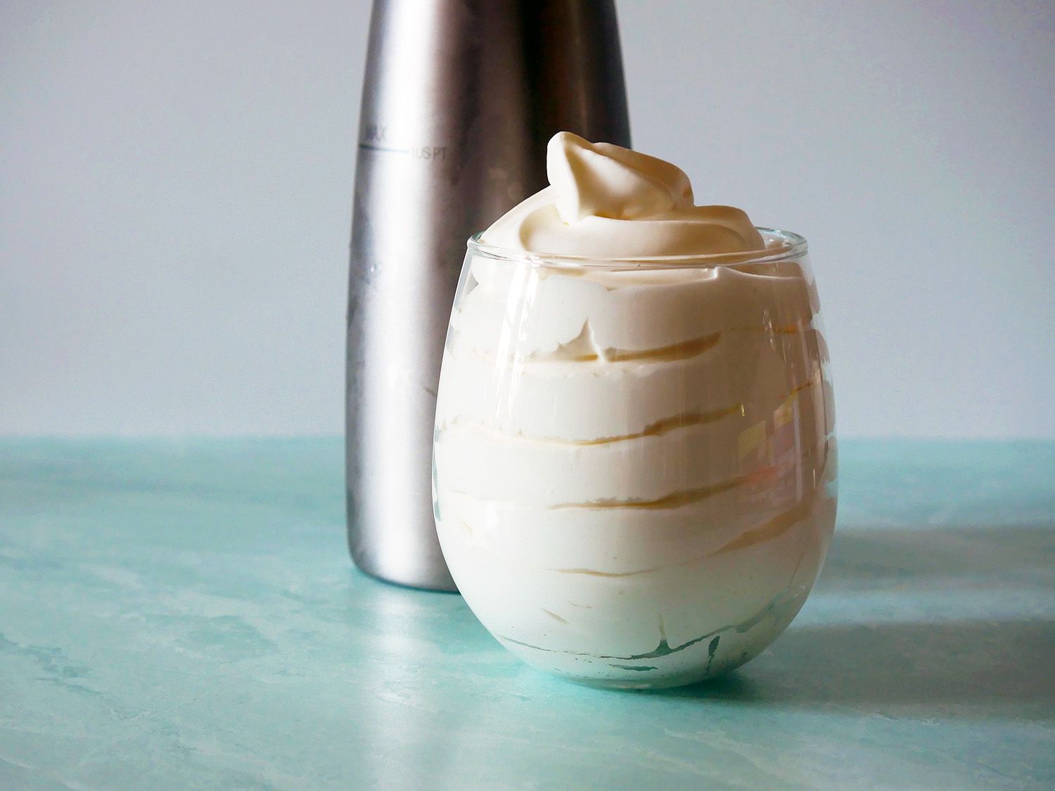 whipped cream in a large glass