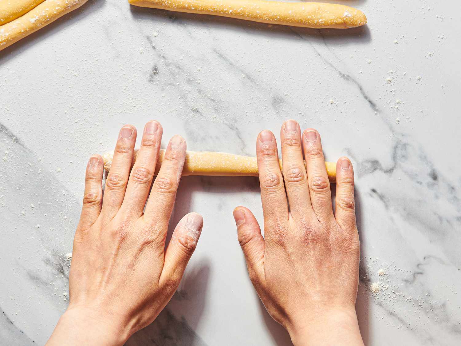 Overhead view of rolling dough