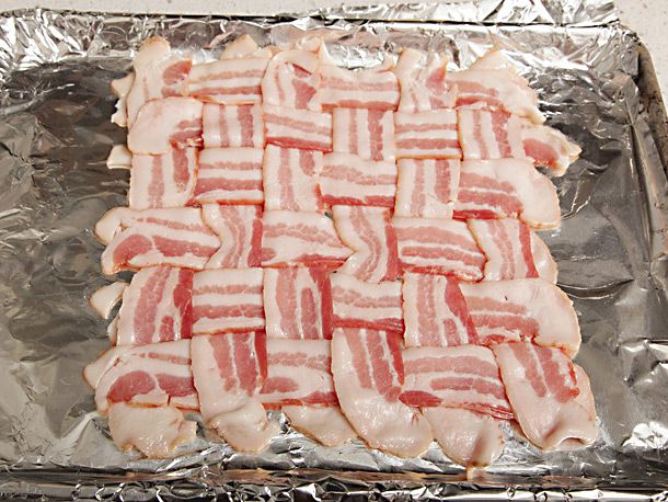 The finished bacon weave on a foil-lined sheet pan, ready to be baked.
