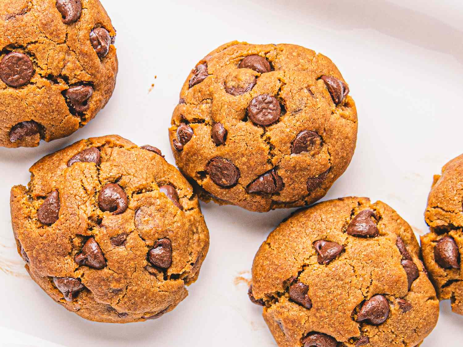 Chocolate chip cookies arranged on a surface