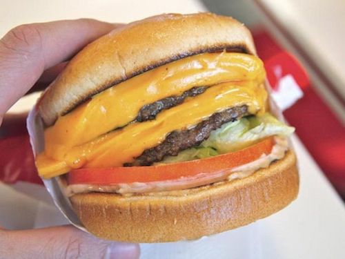 Closeup of an In-n-Out cheeseburger.
