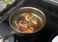 seared chicken in a skillet