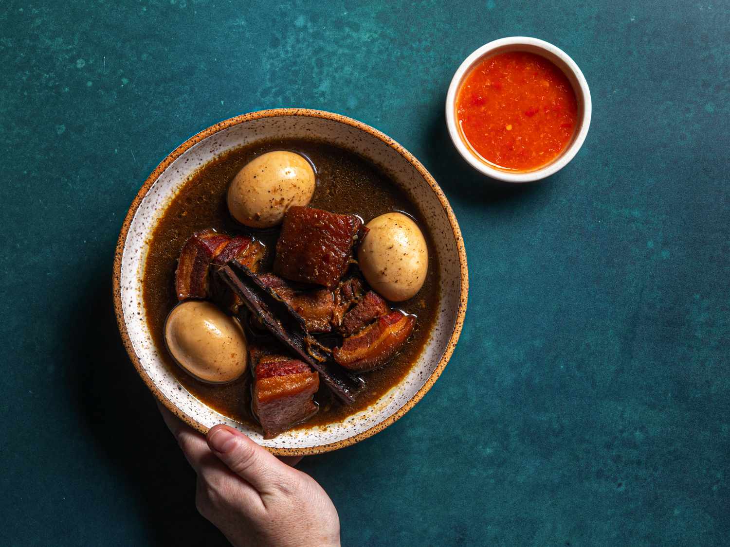 Finished plate of Moo Palo with dipping sauce