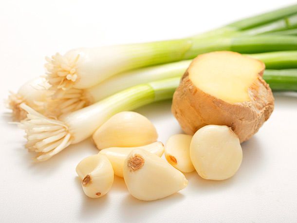 Scallions, garlic, and ginger, ready to be prepped.