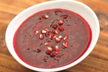 Cranberry-pomegranate sauce, served in a white bowl.