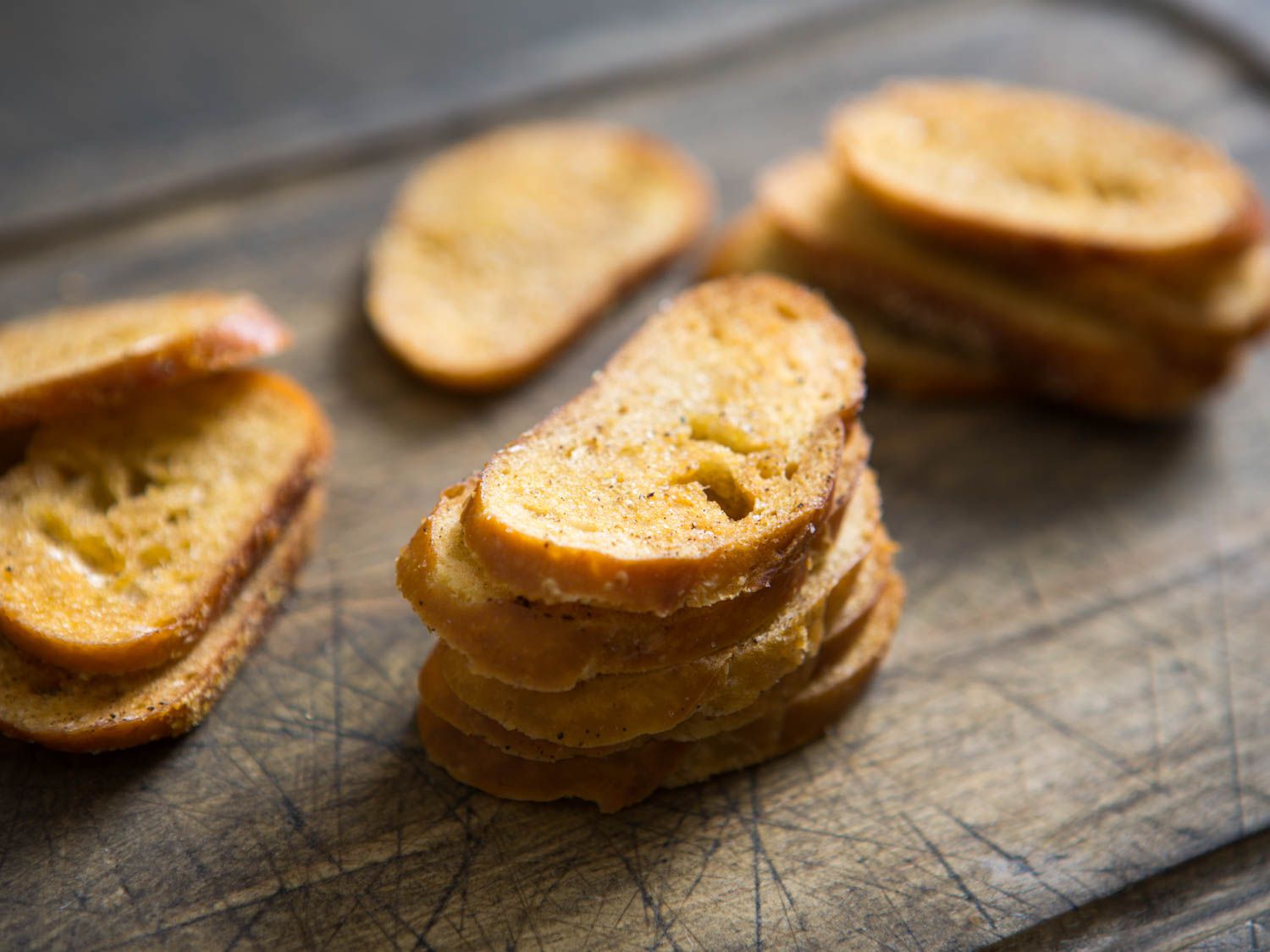 Stacks of golden brown homemade baguette toast "crackers"