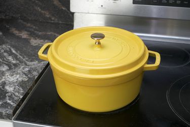 staub dutch oven on stove