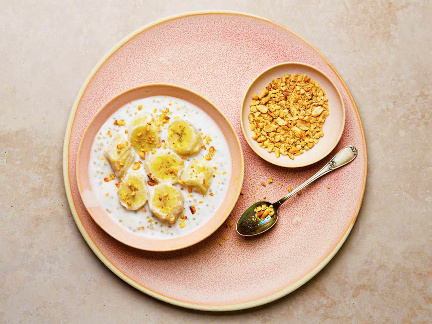 Overhead view of finished che on a platter with peanut toppings