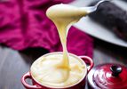 A spoonful of stretchy and richy pommes aligot