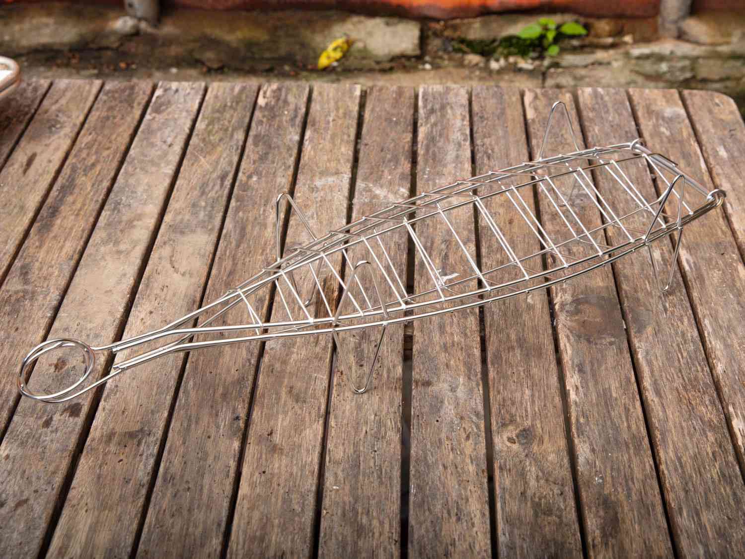 A stainless steel Basque whole-fish grilling basket.
