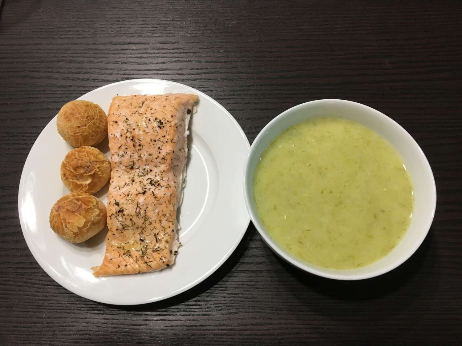 Leek and potato soup with ap late of salmon and brazi bites alongside