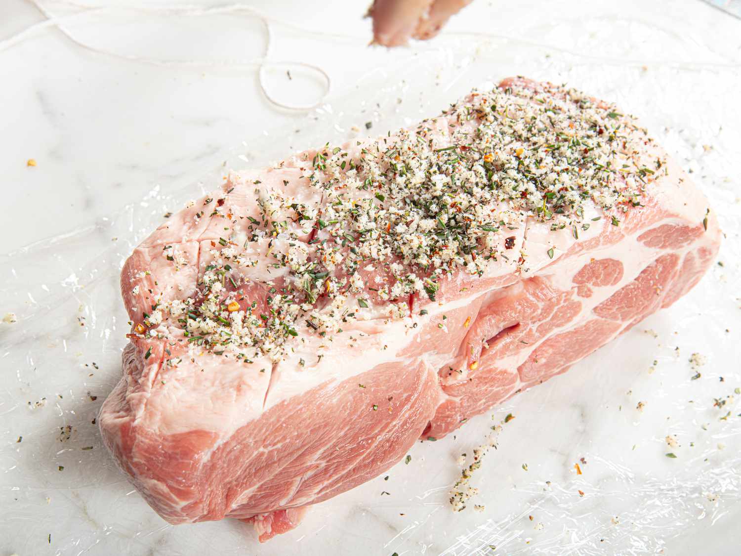 Side view of salting pork