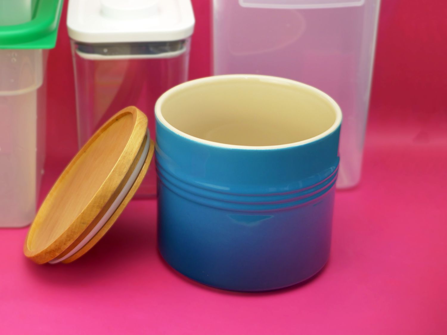 the le creuset container with the lid off, showcasing the wide open mouth