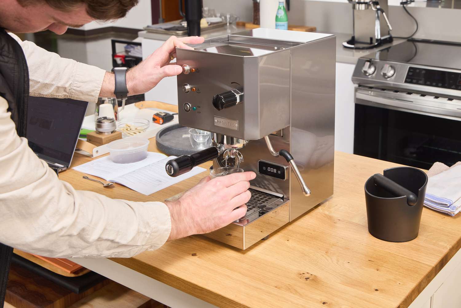 A person makes espresso in the Profitec GO Single Boiler Espresso Machine