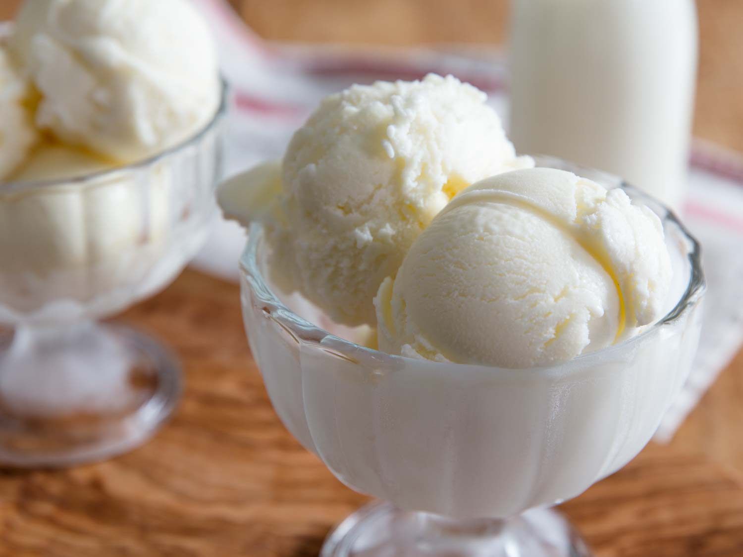 Scoops of homemade fior di latte gelato in serving glasses.