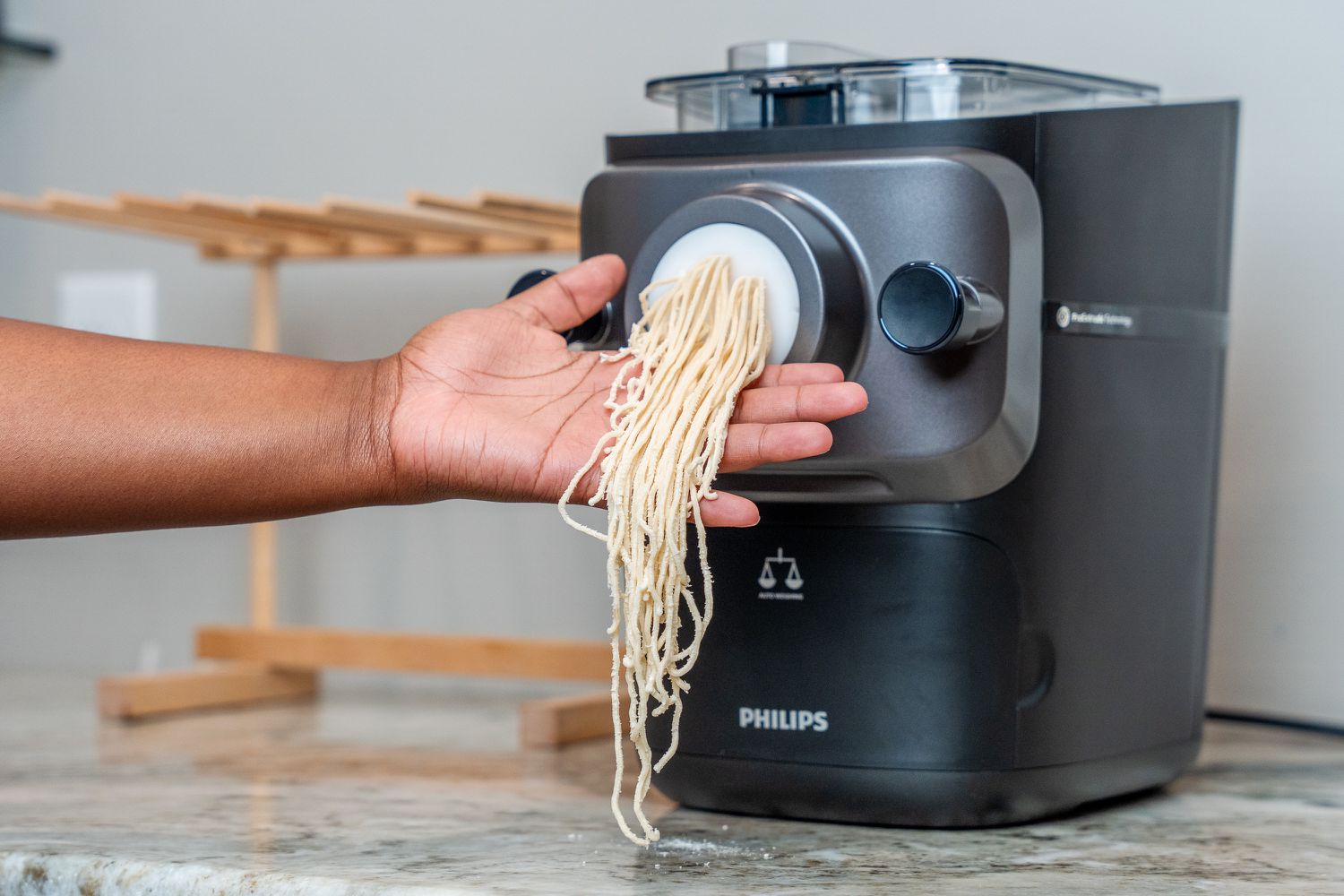person making noodles with Philips Artisan Smart Pasta Maker