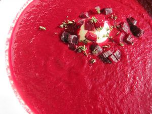 Closeup of Roasted Beet Soup with Thyme, Lemon, and Crème Fraîche.